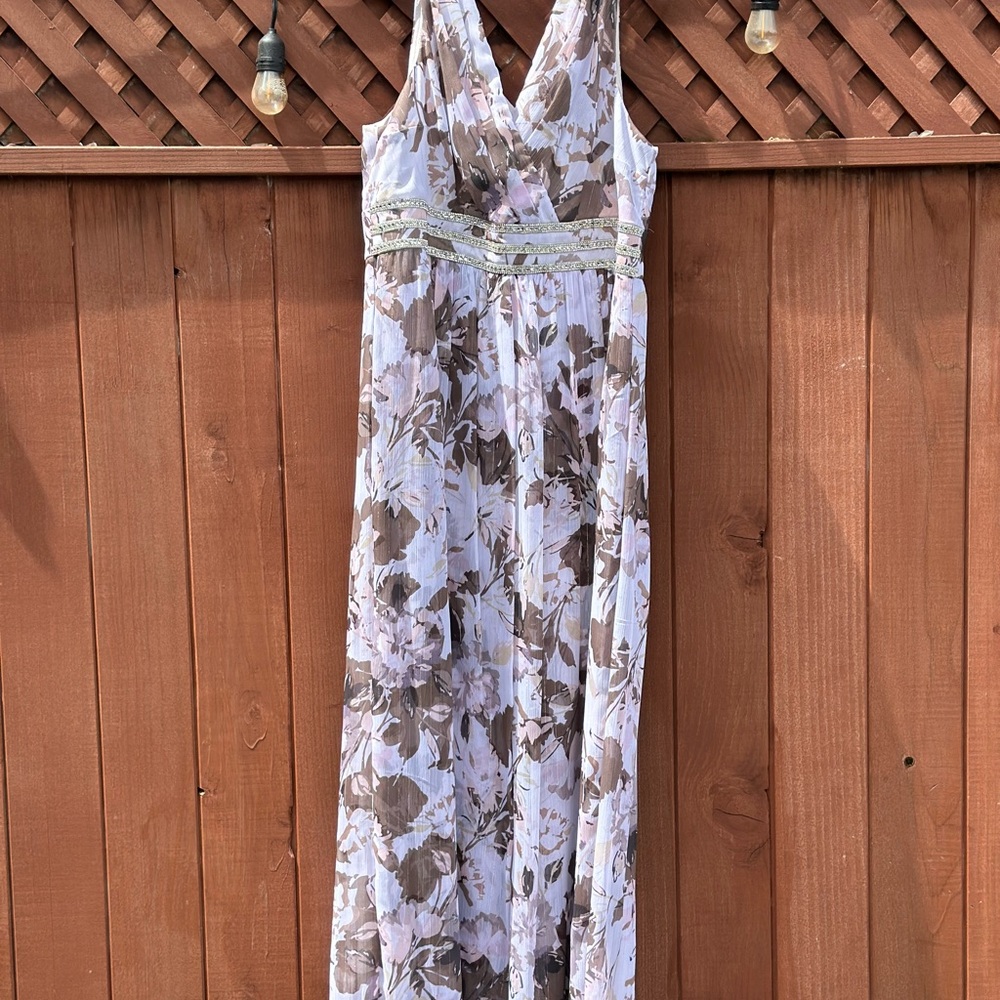 Excellent condition, R&M Richards size 16 women’s. Long gown, formal wear.
